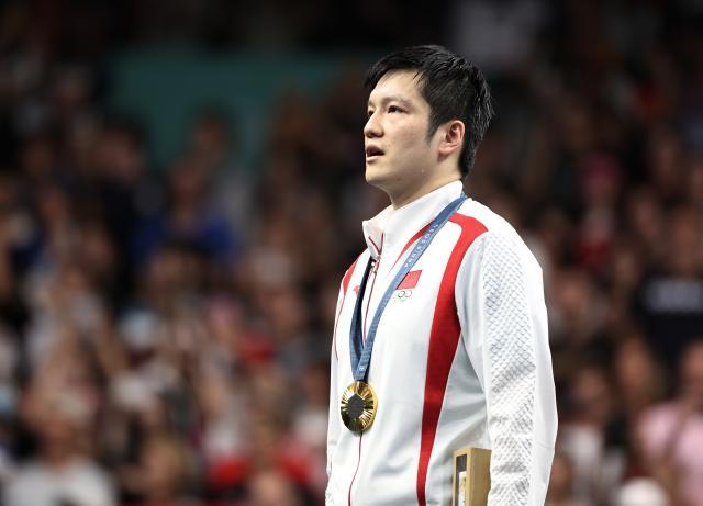 1722822192173049871.jpg 巴黎奥运会+_+乒乓球——男单决赛:樊振东夺得金牌XxjpseC011010_20240804_MVPFN0A001.jpg