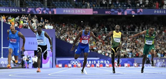 1722823741545074064.jpg 巴黎奥运会丨田径——男子100米:美国选手莱尔斯夺冠XxjpseC008904_20240805_MVPFN0A001.jpg